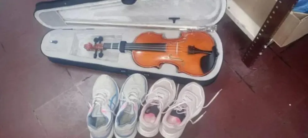 Violín y zapatillas